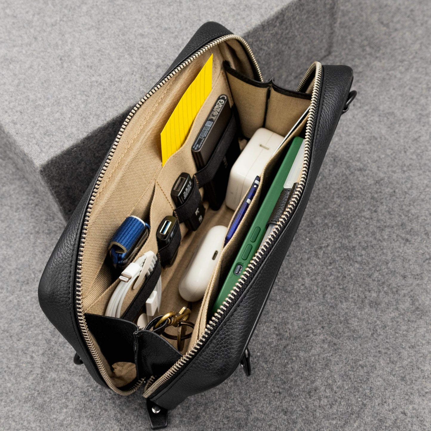 Tech pouch for cords, cables, electronics organization in leather