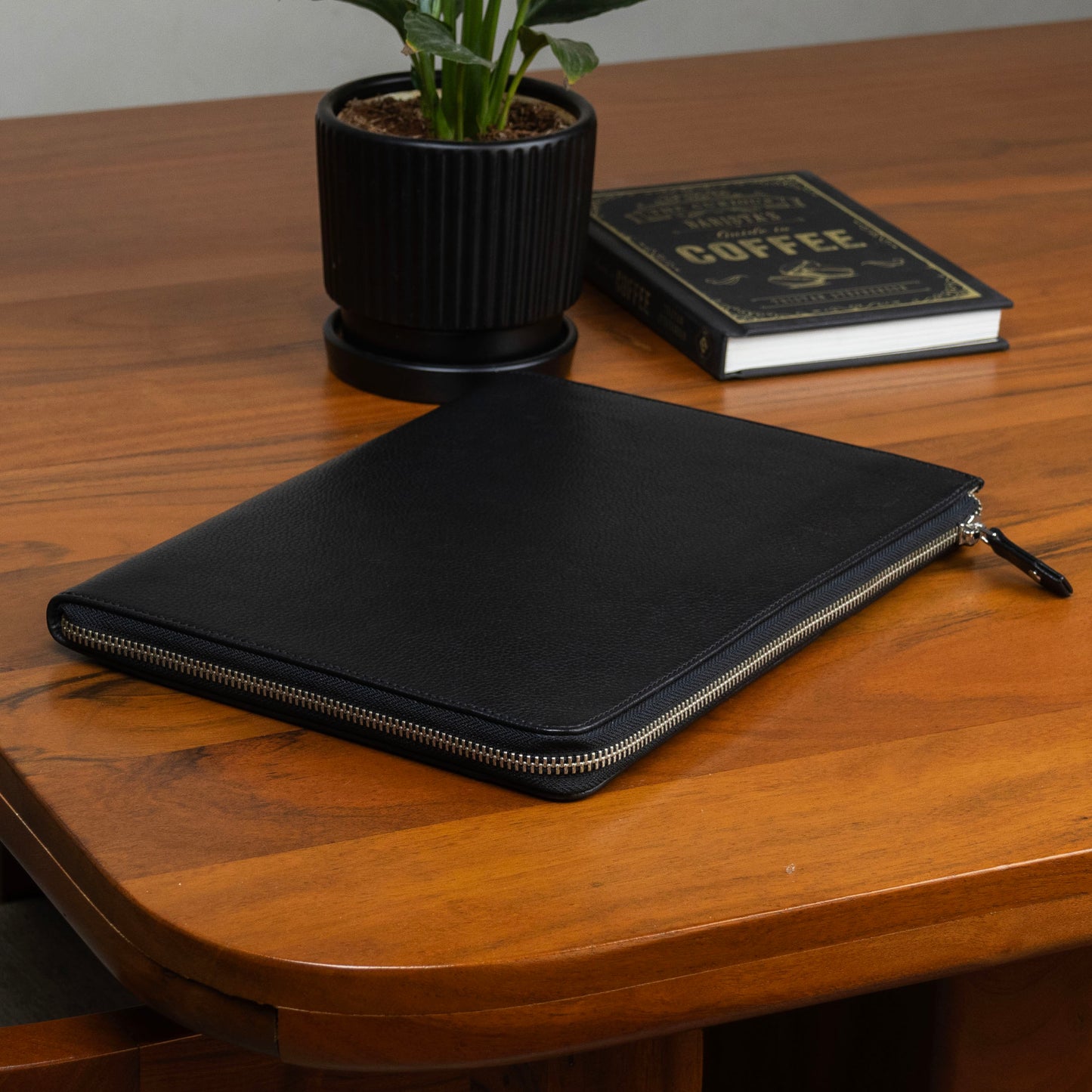 iPad Leather Case with an L-Zip design. Carries your iPad device as well as notebooks.