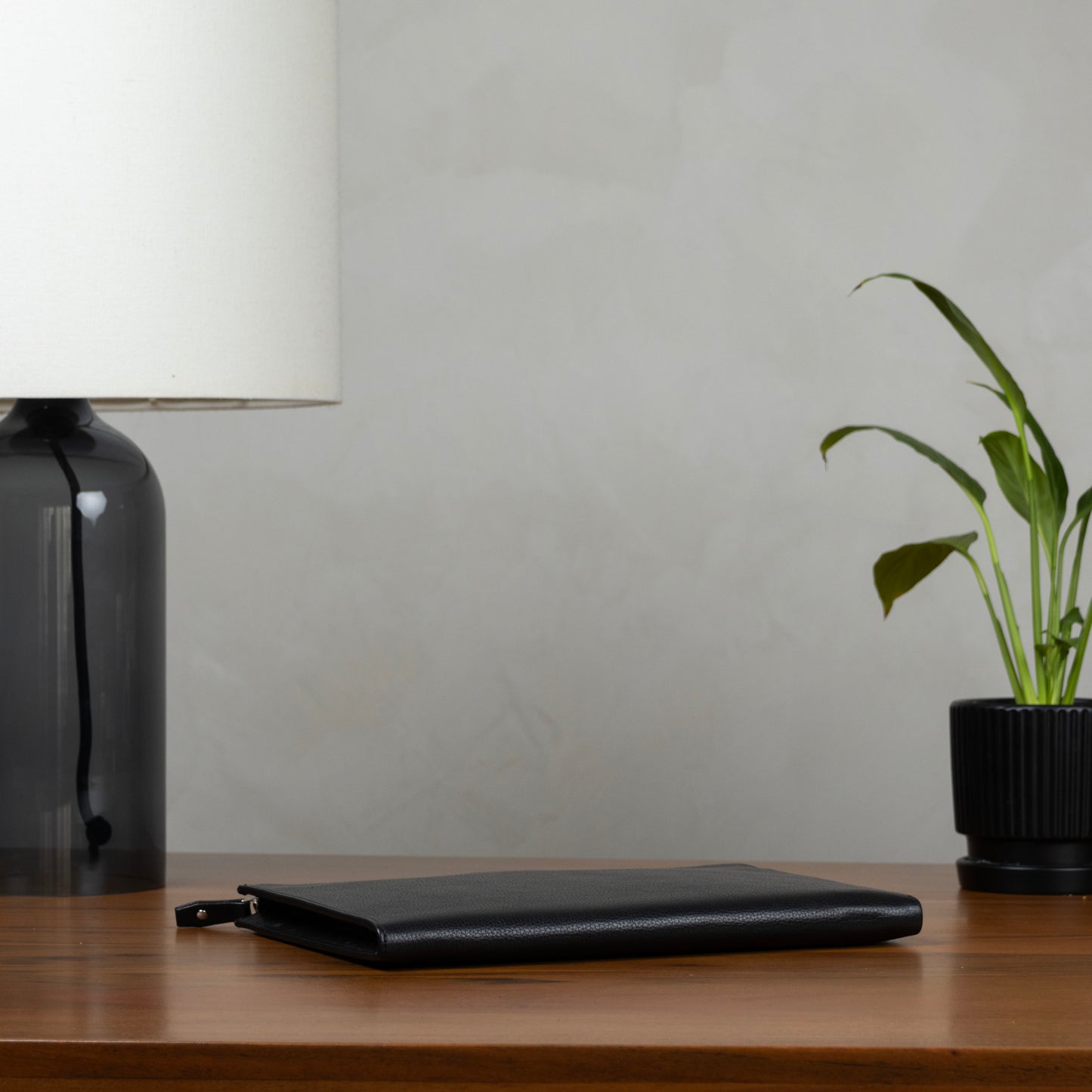 The iPad Case has a slim design that is easy to carry and also store inside a backpack or bag.