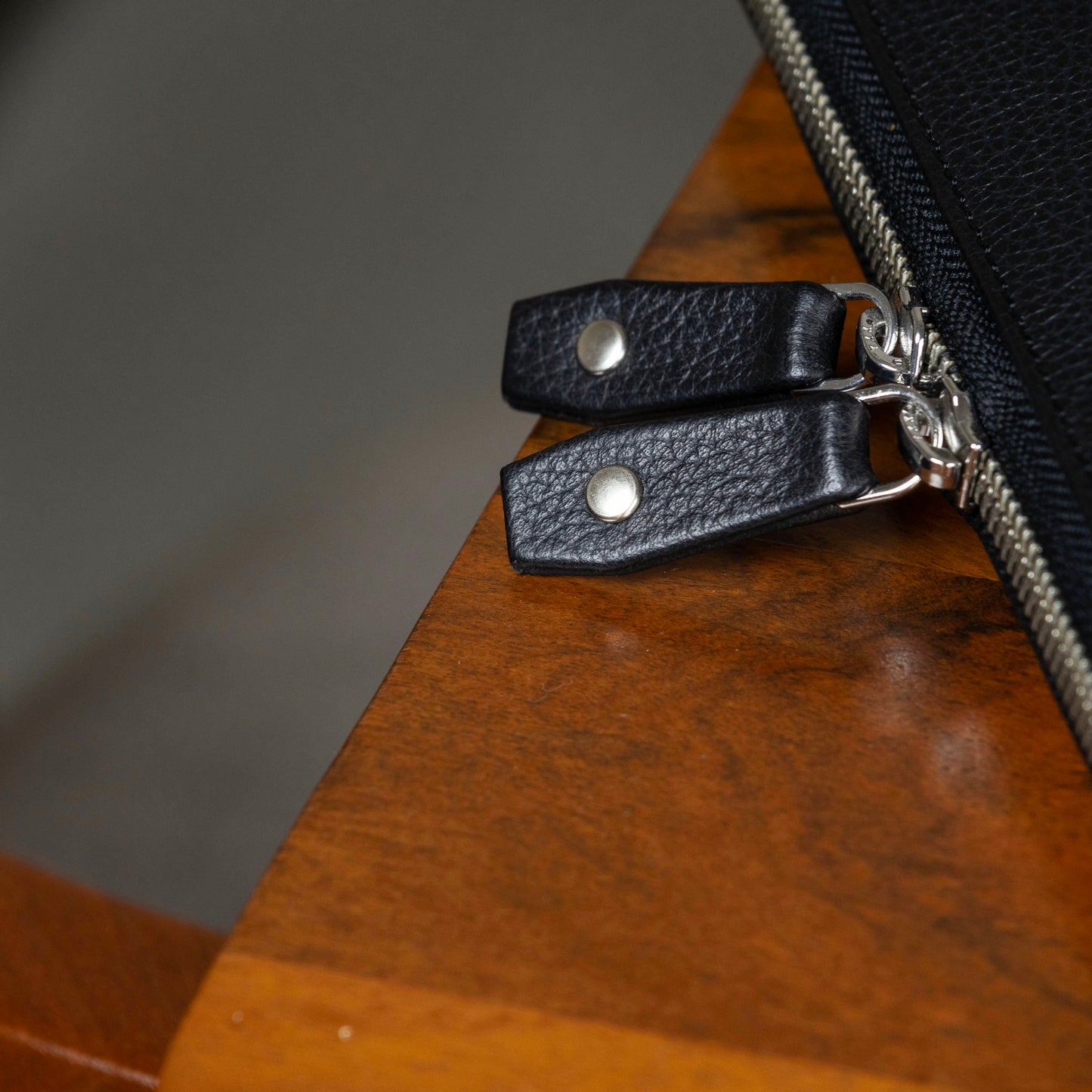 YKK Zippers with leather pull tabs.