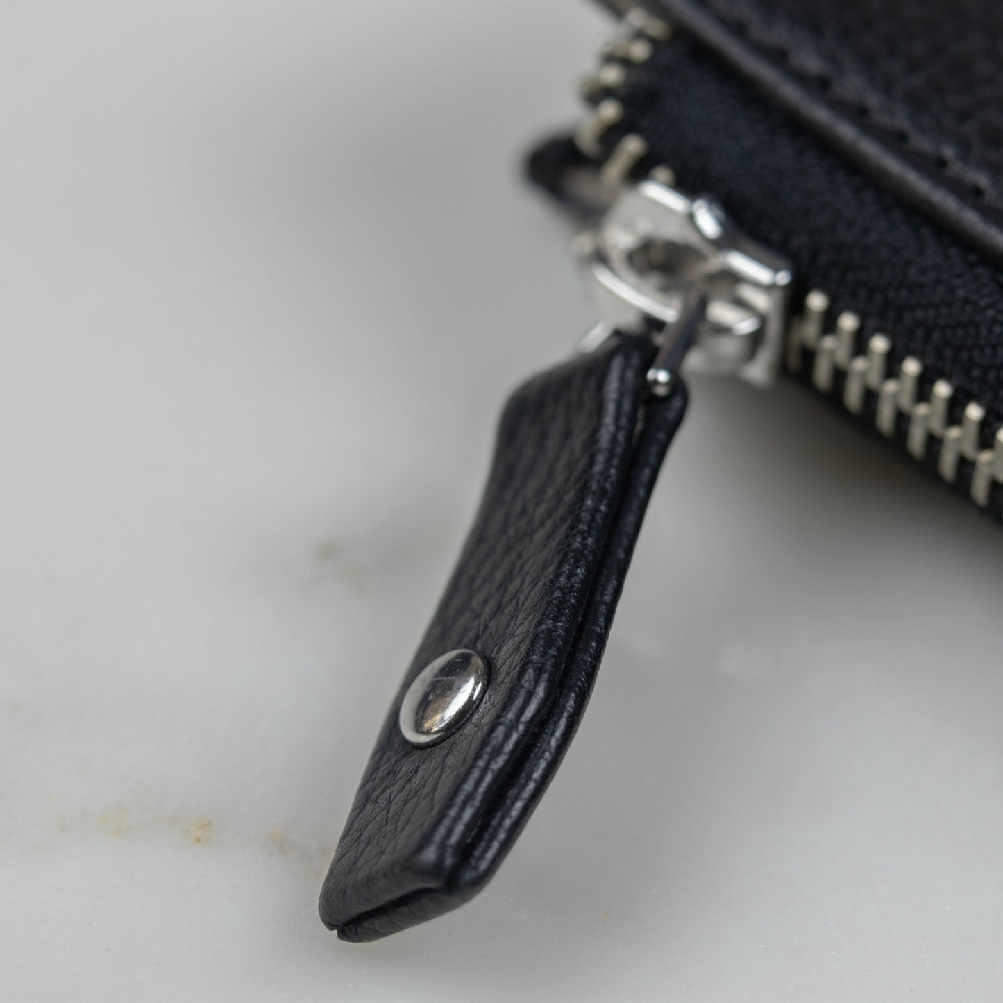Leather Pull Tabs with YKK zippers on the iPad Case