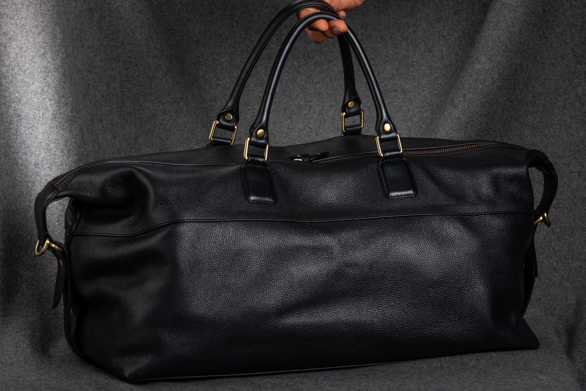 Duffle Bag can be carried in Hand or on Shoulders with the removable adjustable strap