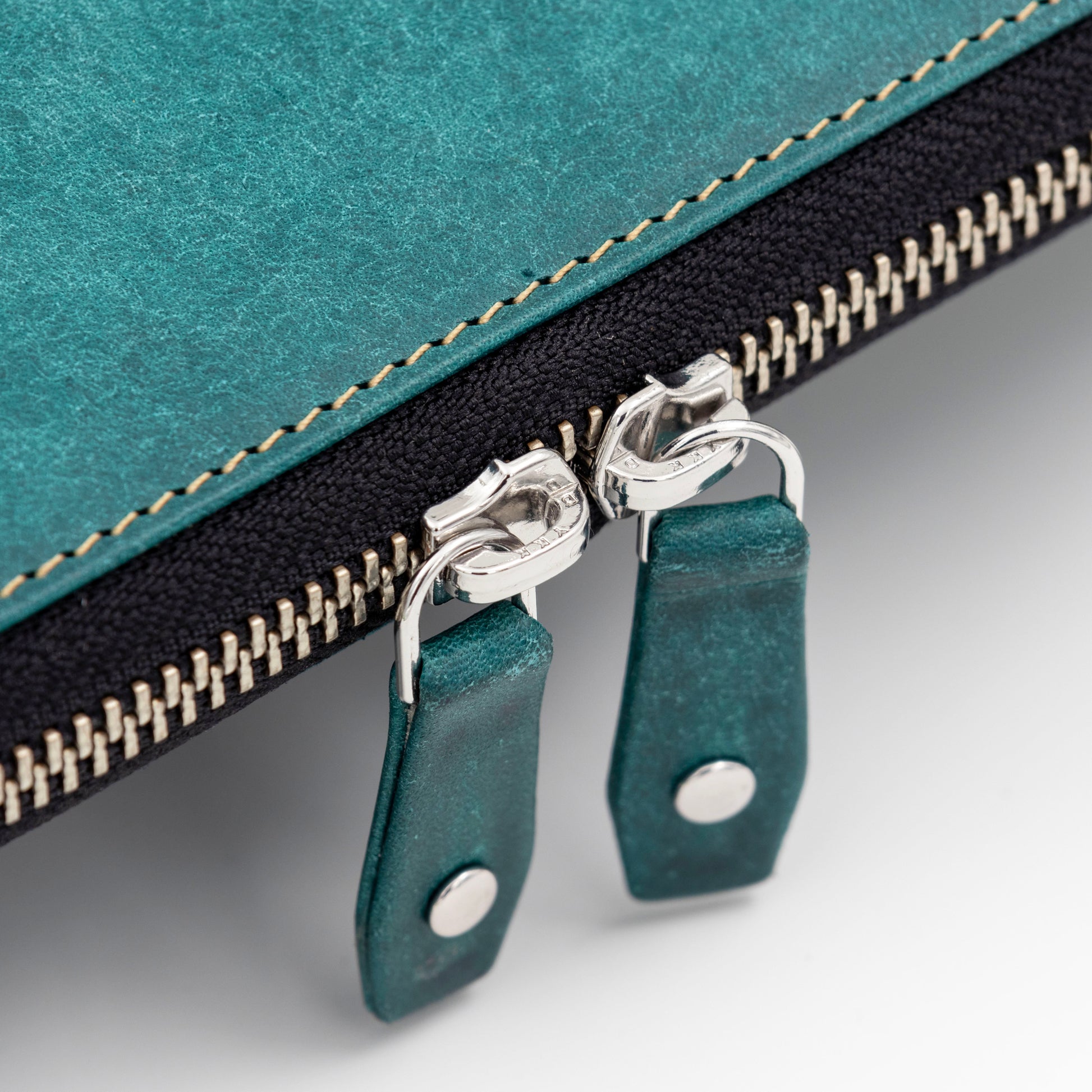 The laptop case is designed with YKK Zippers that are made to last.