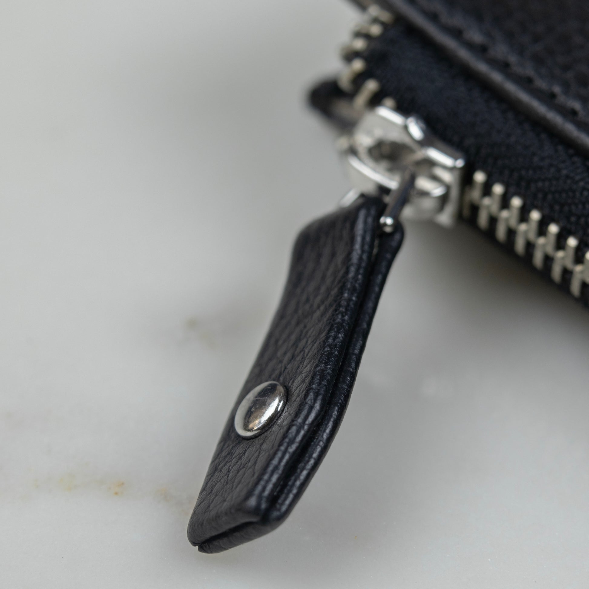 Leather Pull Tabs with YKK zippers on the iPad Case