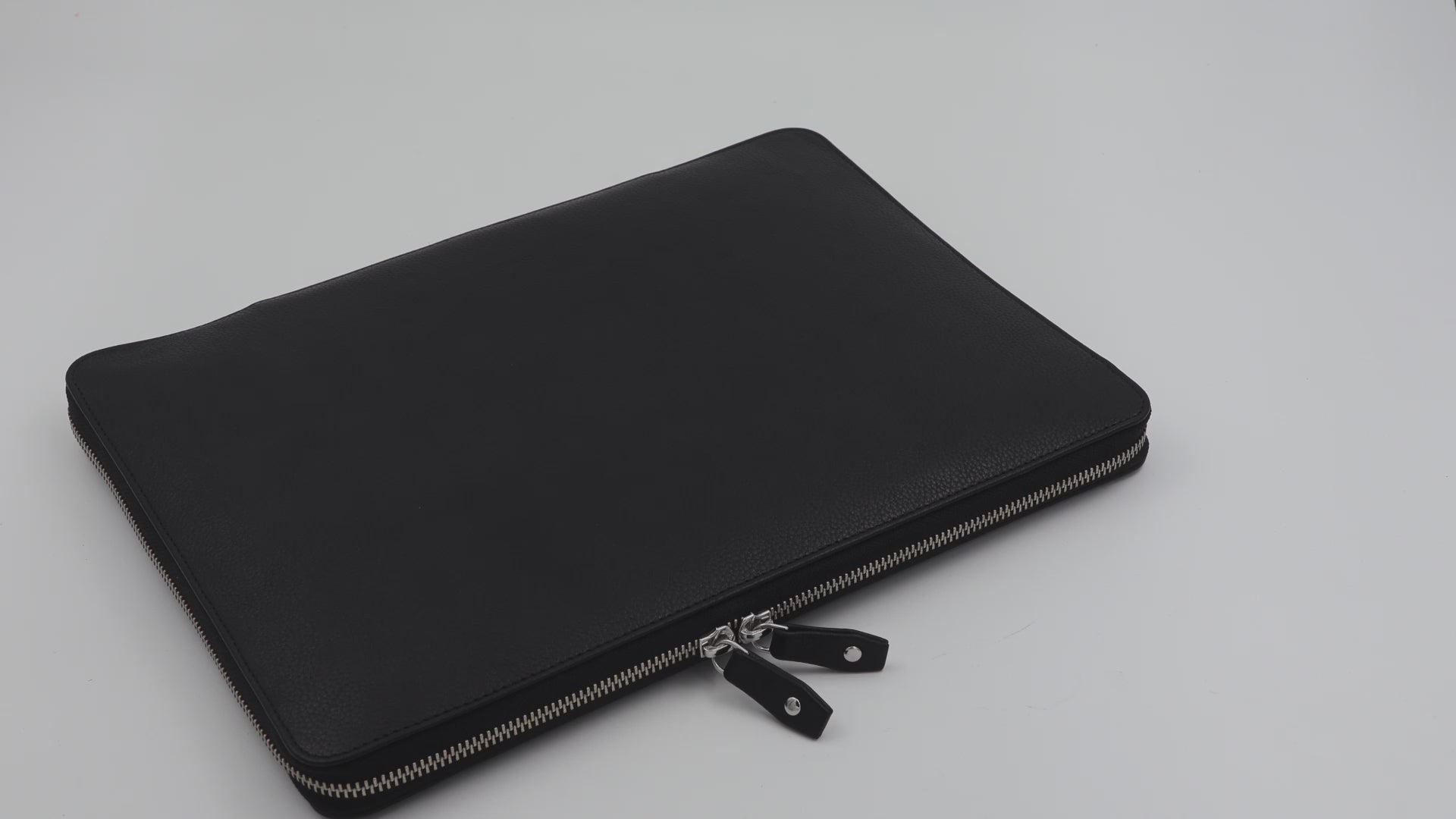 HP Envy Laptop zipper case handmade from black full grain leather in pebble texture. Monogramming available